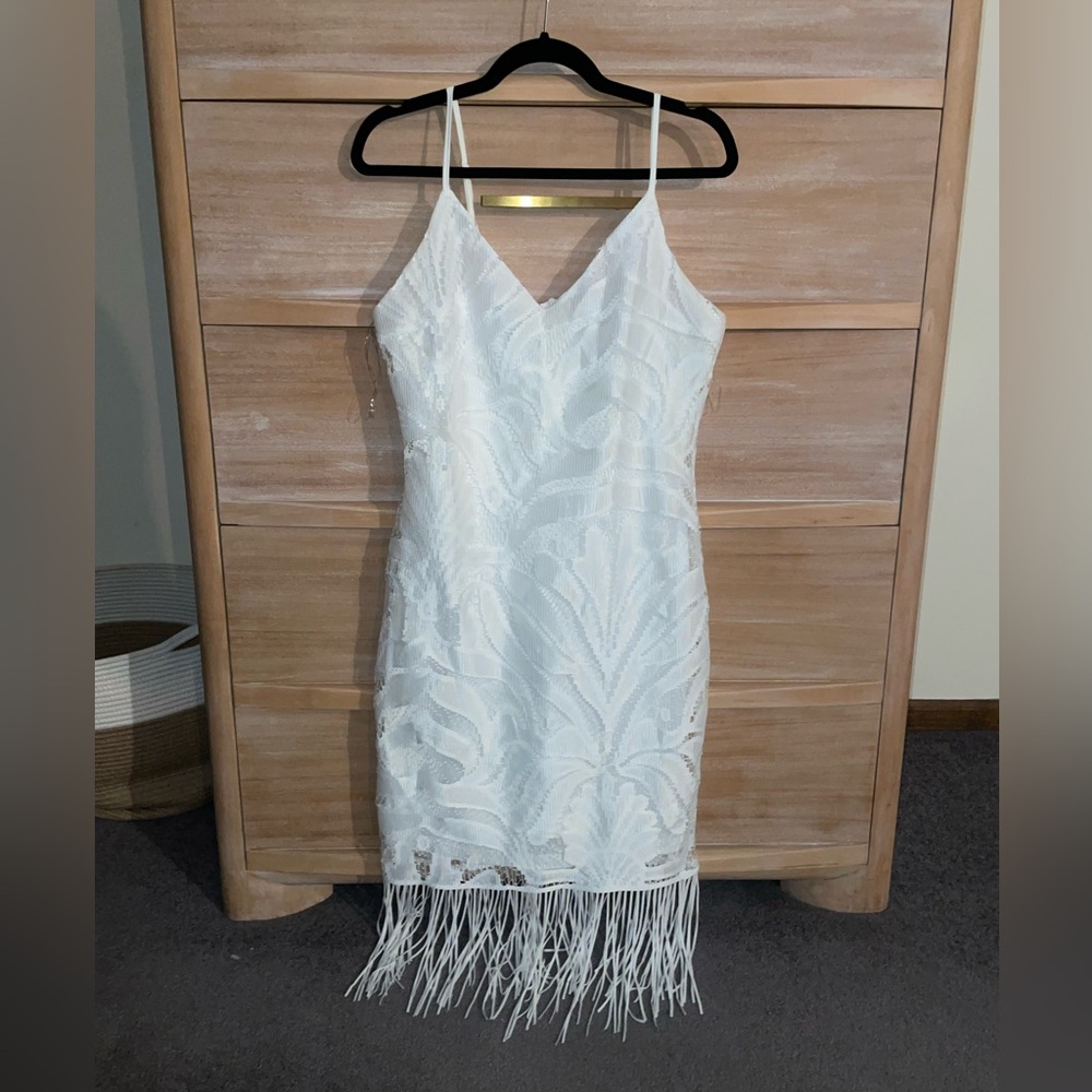 White midi dress with lace detail and fringe